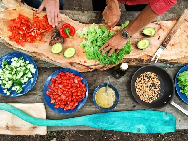 person holding sliced vegetable 2284166